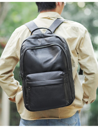 Mens Student Leather Backpack man with backpack 1
