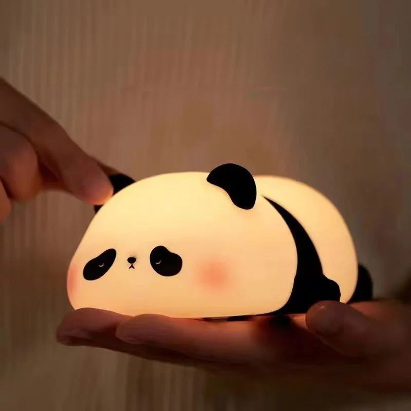 Panda Night Lamp in hands
