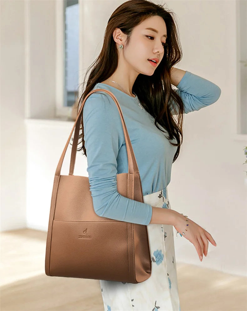 Zmbird Women's Soft Leather Tote Bag woman wearing brown color bag